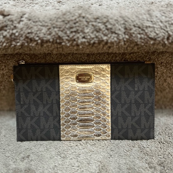 Michael Kors Handbags - Michael Kors Gold Wristlet Like New